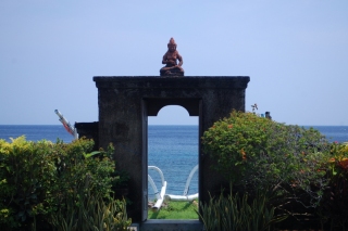 The doorway to the beach, the coral and fishies about ten paces and a splash from Buddha