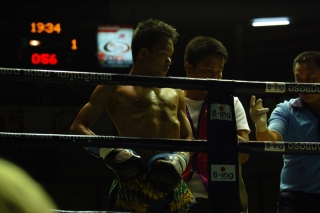 A muay thai fighter prepares for his fight.  I could do this.  Certainly my body looks much the same