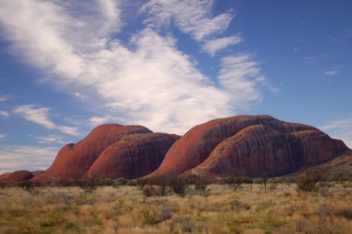 Vast blue skies were very common in the red centre, but even here clouds couldn't be held at bay forever