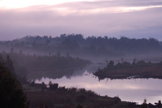 Mist hangs over the river as we breakfast before kayaking