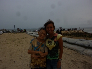Maureen and grandma on the beach