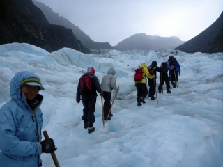 The International Glacier Expedition sets off up the river of ice that is Fox Glacier
