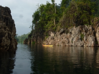 Kayaking through the limestone outcrops of Khao Sok, where once were mountains and valleys is now a lake