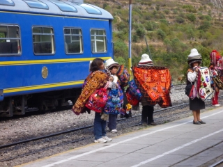 The selling of tat never lets up on the Machu Picchu trail. Here they are on the very train tracks we're going to ride on