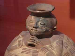 What would you keep in an urn with a face like this?
