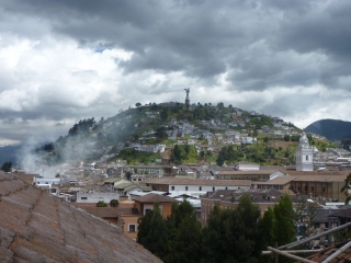 This is the view from our bedroom, the Virgin of Quito looking over the city from her hill
