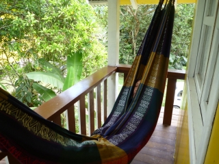 Lost in a hammock, on the balcony of our cosy lodgings in Mindo