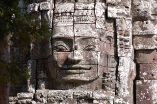 Isn't this just the happiest face you ever saw? He guards the gate of Ta Som temple, and obviously loves his job