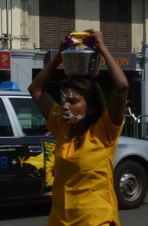 Bravo to the only female Thaipusan processioner we saw, very restrained with only tongue and cheeks pierced