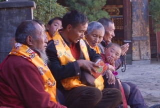 Chanting monks, young and old, at the Jokhang temple